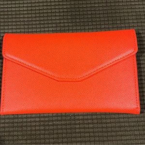 NWOT. Passport holder/travel wallet.
